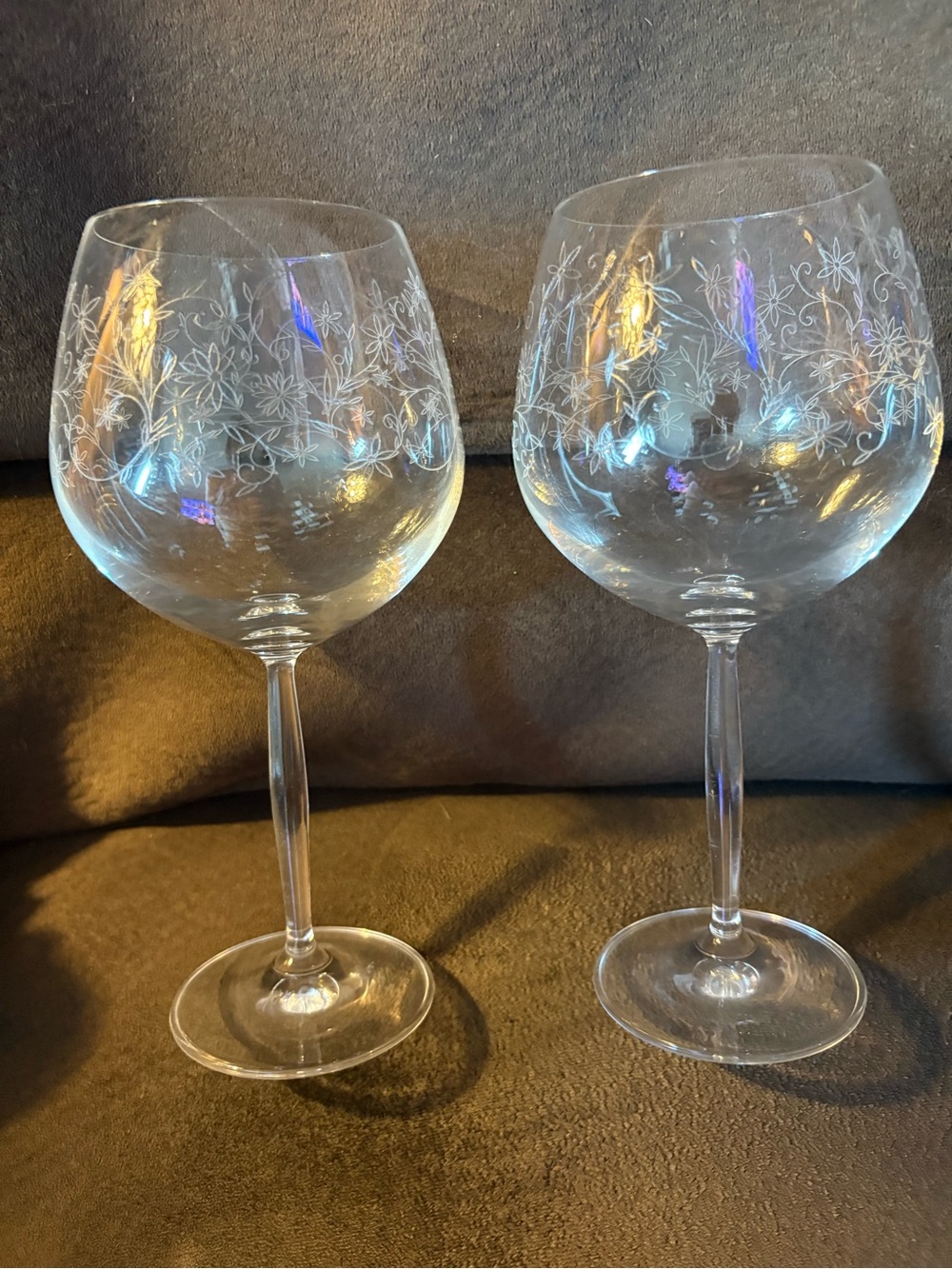 Two etched wine glasses. Very pretty.